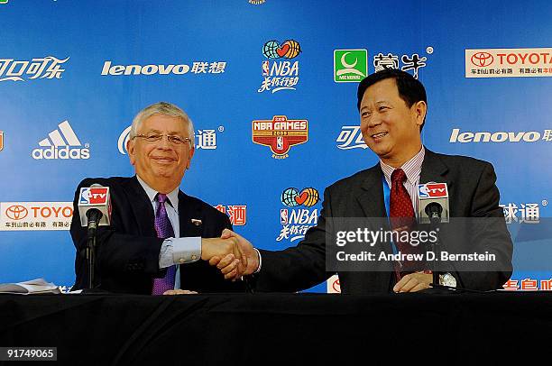 Commissioner David Stern and Vice President of the Chinese Basketball Association Li Jinsheng shake hands during a press conference prior to the game...