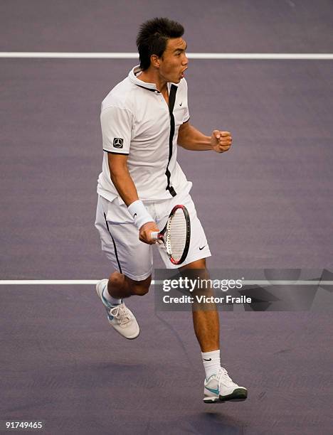 Shao-Xuan Zeng of China celebrates a point against Dudi Sela of Israel during the day one of the 2009 Shanghai ATP Masters 1000 at the Qi Zhong...