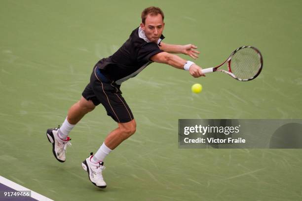 Dudi Sela of Israel returns a shot to Shao-Xuan Zeng of China during the day one of the 2009 Shanghai ATP Masters 1000 at the Qi Zhong Tennis Centre...