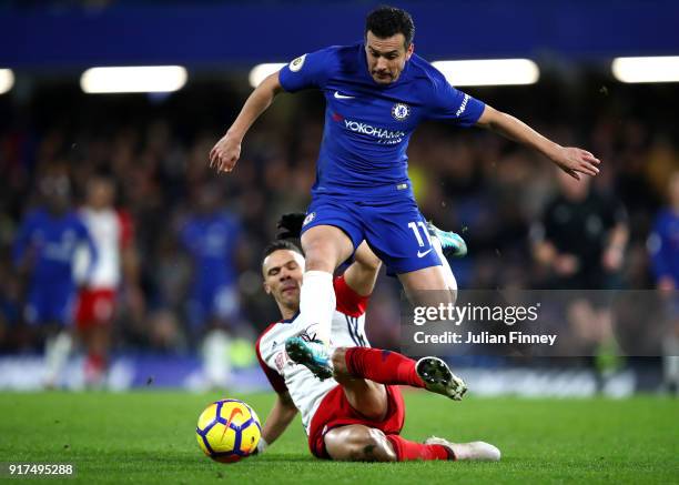 Pedro of Chelsea is tackled by Kieran Gibbs of West Bromwich Albion during the Premier League match between Chelsea and West Bromwich Albion at...