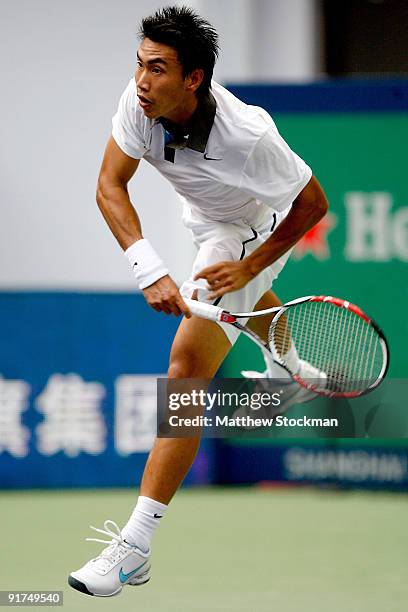 Shao-Xuan Zeng of China serves to Dudi Sela of Israel during day one of the 2009 Shanghai ATP Masters 1000 at Qi Zhong Tennis Centre on October 11,...