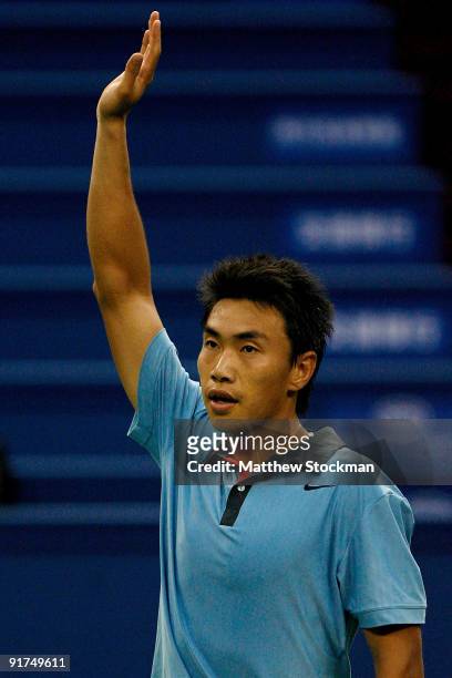 Shao-Xuan Zeng of China acknowledges the crowd after defeating Dudi Sela of Israel during day one of the 2009 Shanghai ATP Masters 1000 at Qi Zhong...
