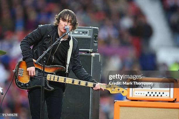 Tord Overland Knudsen bassist for The Wombats performs ahead of the the Engage Super League Grand Final between Leeds Rhinos and St Helens at Old...