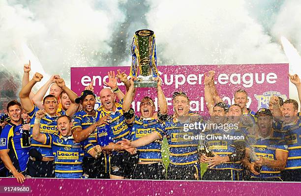Kevin Sinfield of Leeds Rhinos lifts the trophy after winning the Engage Super League Grand Final between Leeds Rhinos and St Helens Old Trafford on...