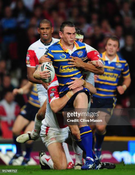 Kevin Sinfield of Leeds Rhinosis tackled during the Engage Super League Grand Final between Leeds Rhinos and St Helens Old Trafford on October 10,...