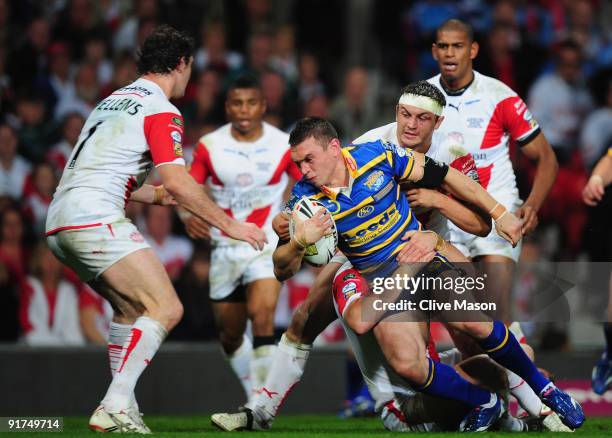 Kevin Sinfield of Leeds Rhinosis tackled during the Engage Super League Grand Final between Leeds Rhinos and St Helens Old Trafford on October 10,...