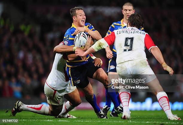 Danny McGuire of Leeds Rhinos is tackled during the Engage Super League Grand Final between Leeds Rhinos and St Helens Old Trafford on October 10,...