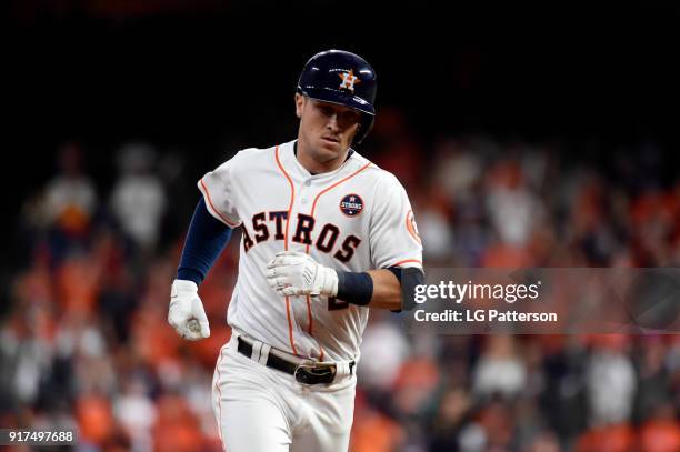 Alex Bregman of the Houston Astros rounds the bases after hitting a solo hoe run in the ninth inning during Game 4 of the 2017 World Series against...