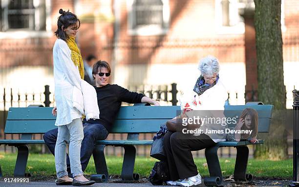 Katie Holmes, Tom Cruise, Kathy Holmes and Suri Cruise visit Charles River Basin on October 10, 2009 in Cambridge, Massachusetts.