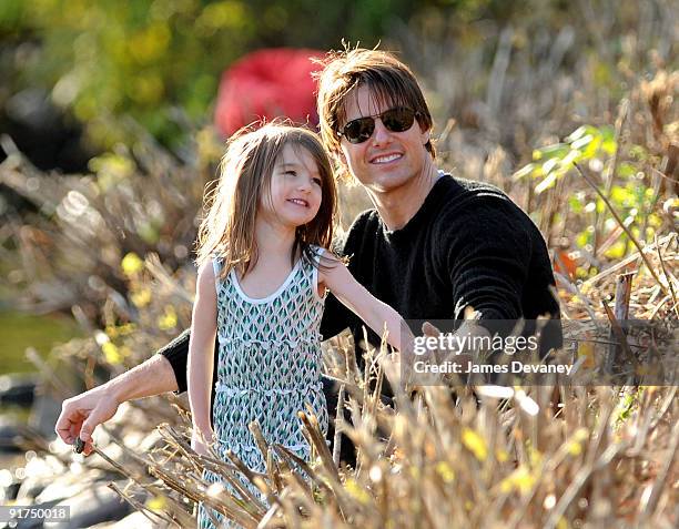 Suri Cruise and Tom Cruise visit Charles River Basin on October 10, 2009 in Cambridge, Massachusetts.