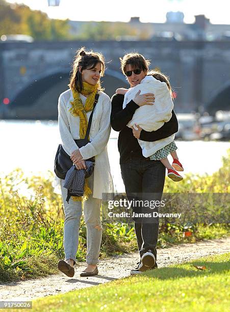 Katie Holmes, Suri Cruise and Tom Cruise visit Charles River Basin on October 10, 2009 in Cambridge, Massachusetts.