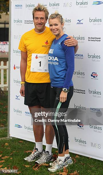 Ben Fogle and Nell McAndrew takes part in the Royal Parks Foundation Half Marathon at Hyde Park on October 11, 2009 in London, England.