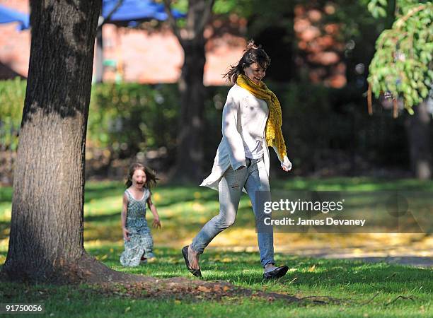 Suri Cruise and Katie Holmes visit Charles River Basin on October 10, 2009 in Cambridge, Massachusetts.