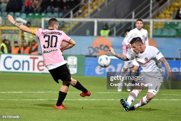 Giuseppe Loiacono of Foggia blocks a shot from Ilija Nestorovski using his hand which resulted in a penalty kick for Palermo during the Serie B match...