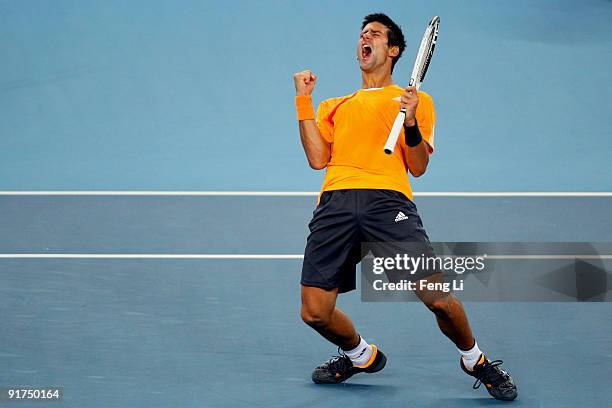 Novak Djokovic of Serbia celebrates a shot against Marin Cilic of Croatia in the men's final match during day ten of the 2009 China Open at the...