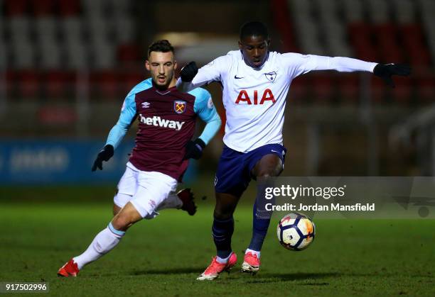 Shilow Tracey of Tottenham tackles with Sead Haksabanovic of West Ham during the Premier League 2 match between West Ham United and Tottenham Hotspur...