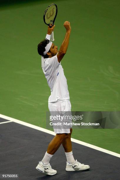 Feliciano Lopez of Spain celebrates match point against Guillermo Garcia-Lopez of Spain during day one of the 2009 Shanghai ATP Masters 1000 at Qi...