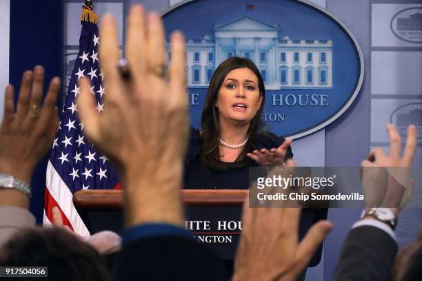 White House Press Secretary Sarah Huckabee Sanders calls on reporters during a press briefing at the White House February 12, 2018 in Washington, DC....