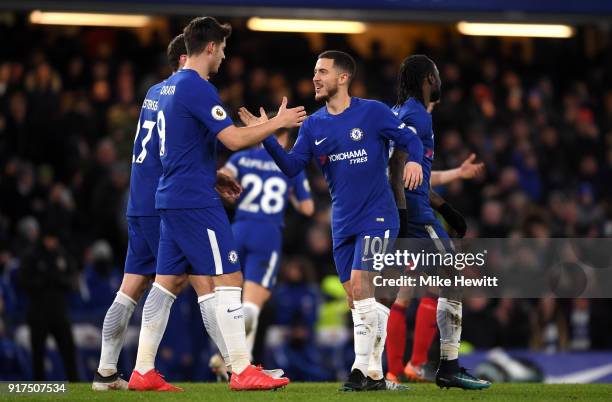 Eden Hazard of Chelsea celebrates after scoring his sides third goal with Alvaro Morata of Chelsea during the Premier League match between Chelsea...