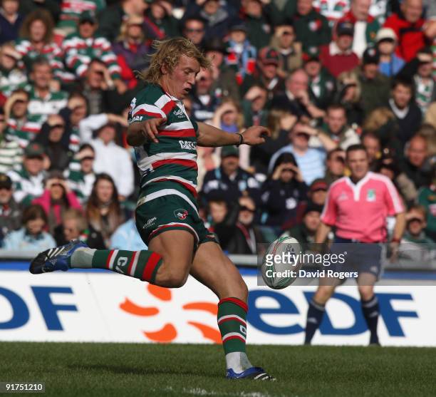 Billy Twelvetrees of Leicester kicks the ball upfield during the Heineken Cup match between Leicester Tigers and Ospreys at Welford Road on October...