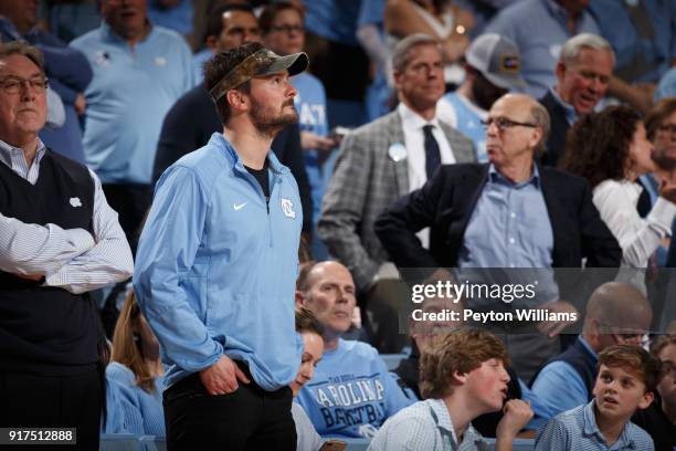 American country music singer Eric Church watches as a fan a game between the North Carolina Tar Heels and the Duke Blue Devils on February 08, 2018...