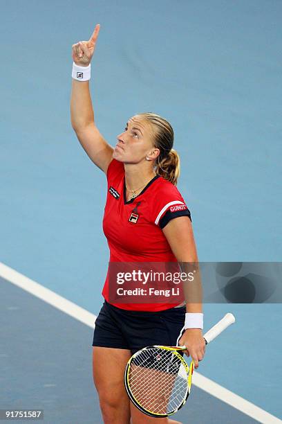 Svetlana Kuznetsova of Russia celebrates winning against Agnieszka Radwanska of Poland in the women's final match during day ten of the 2009 China...