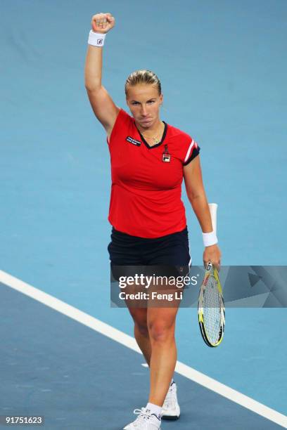 Svetlana Kuznetsova of Russia celebrates winning against Agnieszka Radwanska of Poland in the women's final match during day ten of the 2009 China...