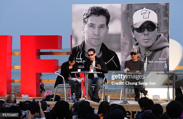 Director Bryan Singer and Kim Ji-Woon attend the Open talk during the 14th Pusan International Film Festival at the Haeundae beach on October 11,...