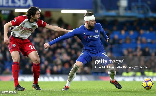 Ahmed El-Sayed Hegazi of West Brom and Olivier Giroud of Chelsea battle for the ball during the Premier League match between Chelsea and West...