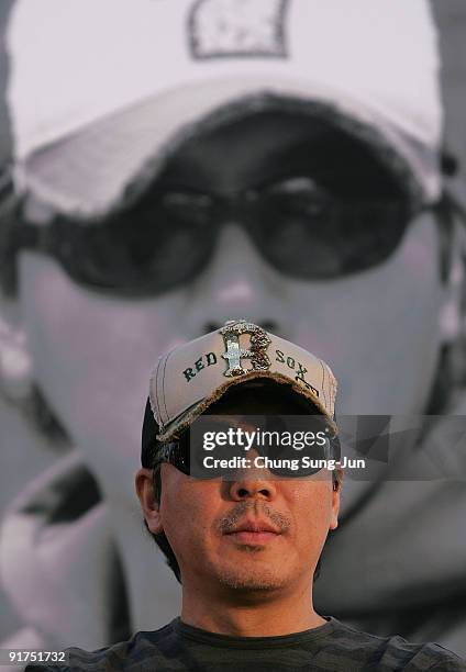 Director Kim Ji-Woon attends the Open talk during the 14th Pusan International Film Festival at the Haeundae beach on October 11, 2009 in Busan,...