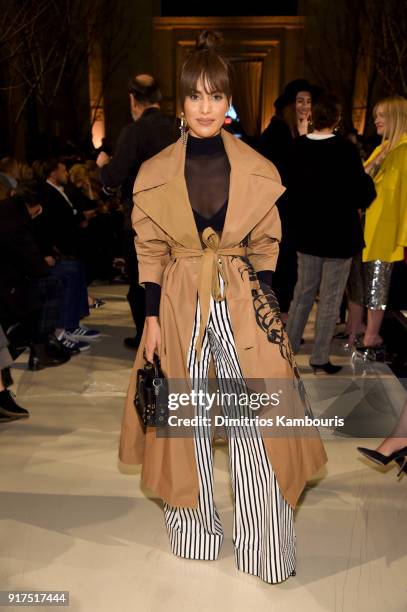 Blogger Camila Coelho attends the Oscar De La Renta fashion show during New York Fashion Week: The Shows at The Cunard Building on February 12, 2018...