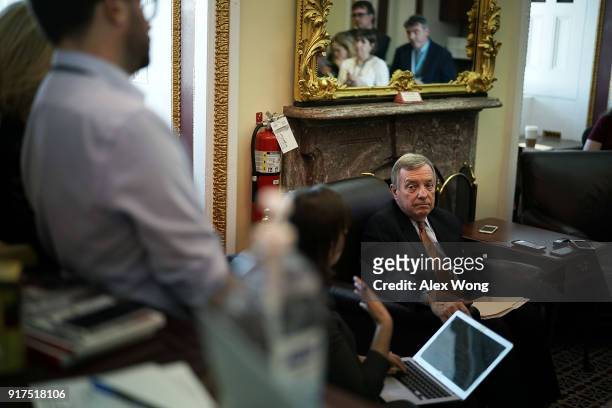 Senate Minority Whip Sen. Richard Durbin speaks to members of the media on immigration during a pen and pad at the Capitol February 12, 2018 in...