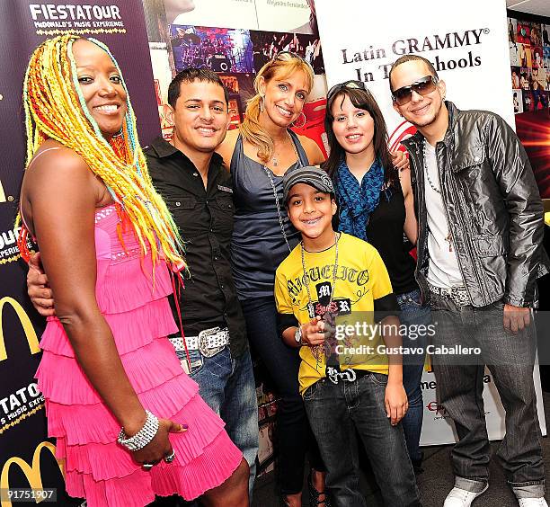 Singers Lucrecia,Angel, Lili Estefan, Alih Jey, Khriz and Miguelito attends the Latin GRAMMY in the Schools at Miami Coral Park Senior High School on...