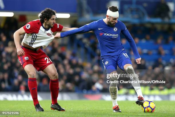 Ahmed El-Sayed Hegazi of West Brom and Olivier Giroud of Chelsea battle for the ball during the Premier League match between Chelsea and West...