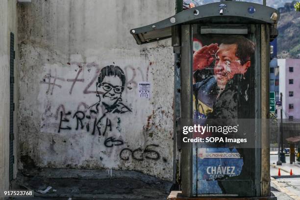 Graffiti wall seen at the cemetery. Remembrance service held in Caracas in honor of those killed during the protests in Venezuela. Group of people...