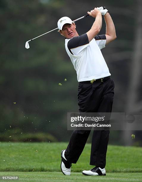 Ernie Els of South Africa and the International Team tees off at the 13th hole during the Day Three Afternoon Fourball Matches in The Presidents Cup...