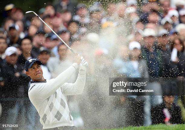 Tiger Woods of the USA plays his third shot at the 8th hole during the Day Three Afternoon Fourball Matches in The Presidents Cup at Harding Park...