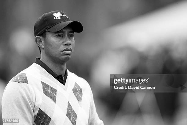 Tiger Woods of the USA Team plays his second shot at the 16th hole during the Day Three Afternoon Fourball Matches in The Presidents Cup at Harding...