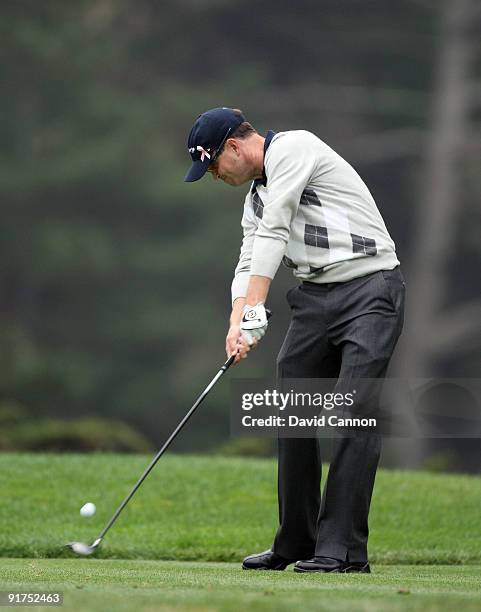 Zach Johnson of the USA team tees off at the 13th hole during the Day Three Afternoon Fourball Matches in The Presidents Cup at Harding Park Golf...