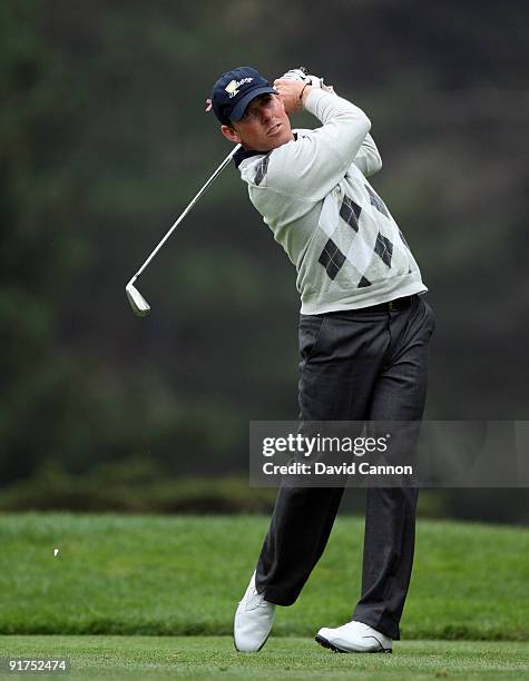 Justin Leonard of the USA team tees off at the 13th hole during the Day Three Afternoon Fourball Matches in The Presidents Cup at Harding Park Golf...