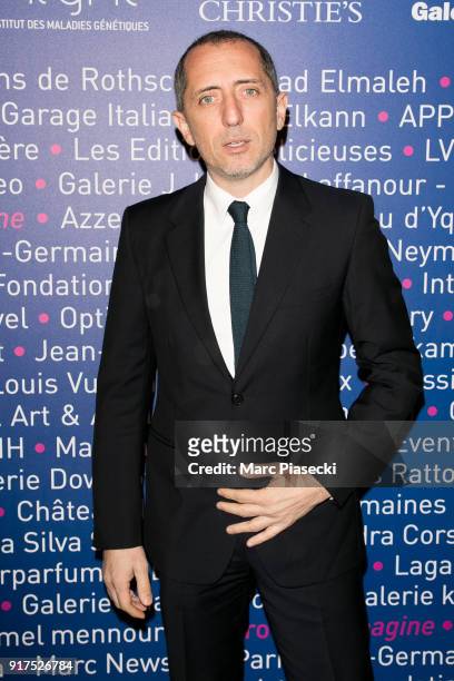 Actor Gad Elmaleh attends the 'Heroes for Imagine' host by Kamel Mennour benefit auction at L'Institut Imagine on February 12, 2018 in Paris, France.