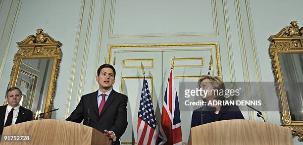 Secretary of State Hillary Rodham Clinton looks over to Britain's Foreign Secretary David Miliband during a press conference at No.1 Carlton Gardens...