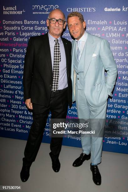 Lapo Elkann and guest attend the 'Heroes for Imagine' host by Kamel Mennour benefit auction at L'Institut Imagine on February 12, 2018 in Paris,...