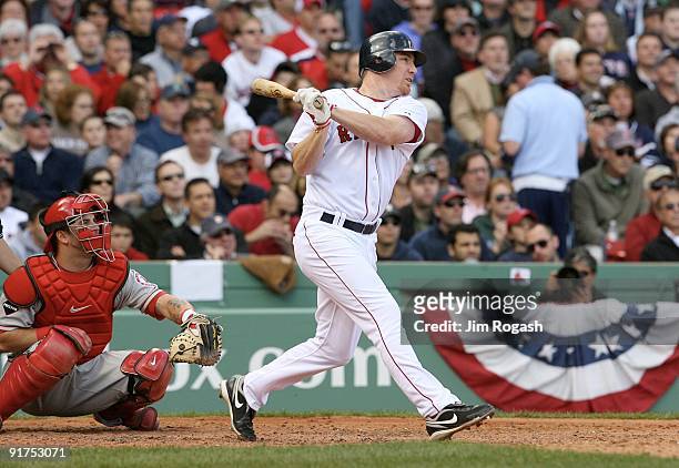 Drew of the Boston Red Sox hits a two-run home run in the fourth inning against the Los Angeles Angels of Anaheim in Game Three of the ALDS during...