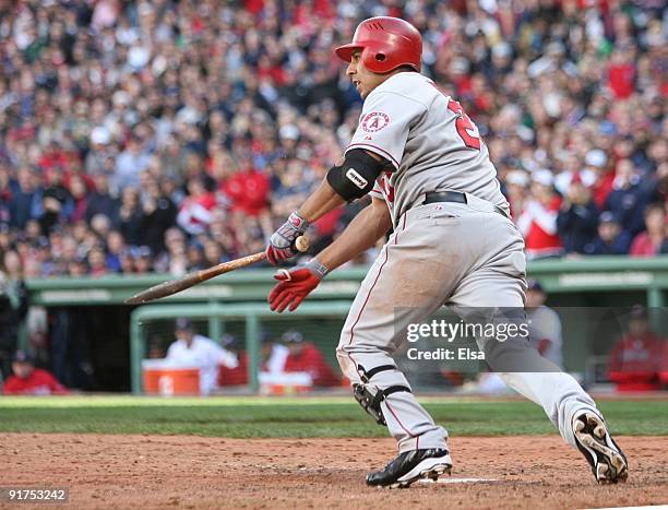 Juan Rivera of the Los Angeles Angels of Anaheim grounded out to score Torii Hunter in the sixth inning of Game Three of the ALDS against the Boston...