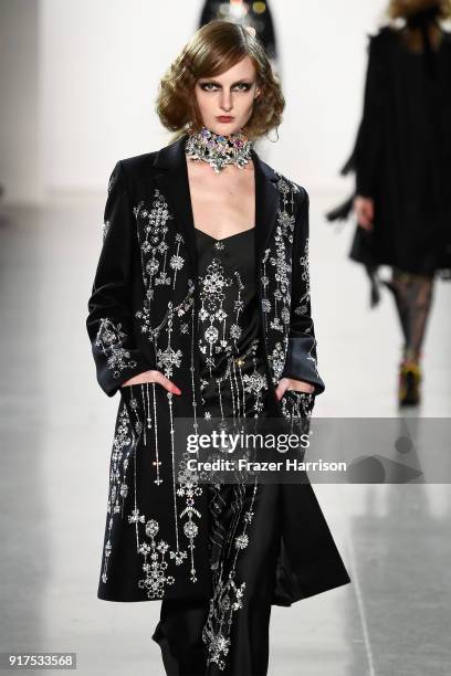 Model walks the runway for Libertine during New York Fashion Week: The Shows at Gallery II at Spring Studios on February 12, 2018 in New York City.
