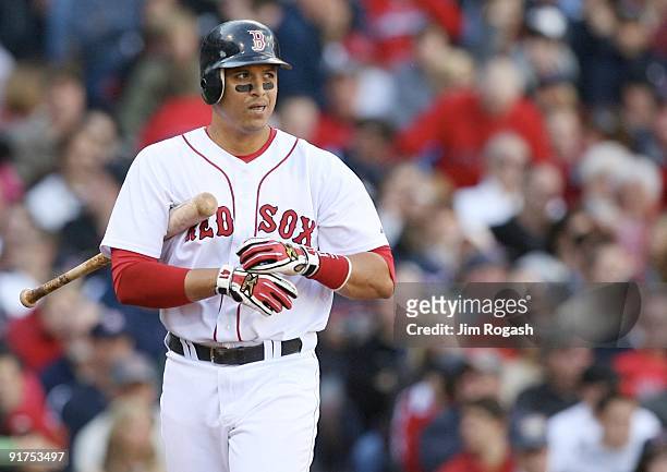 Catcher Victor Martinez of the Boston Red Sox reacts after striking out looking in the seventh inning against the Los Angeles Angels of Anaheim in...