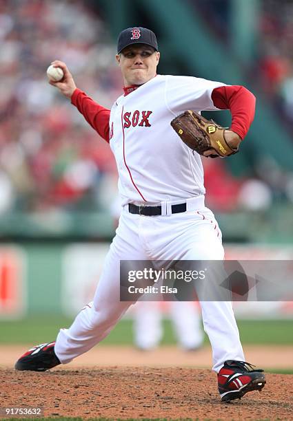 Pitcher Jonathan Papelbon of the Boston Red Sox delivers a pitch against the Los Angeles Angels of Anaheim in the eighth inning of Game Three of the...