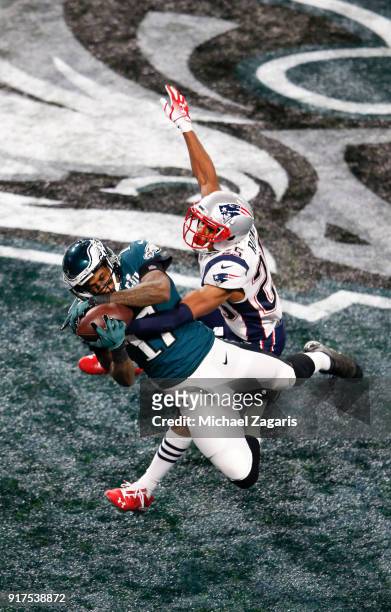 Alshon Jeffery of the Philadelphia Eagles catches a 34-yard touchdown reception during the game against the New England Patriots in Super Bowl LII at...