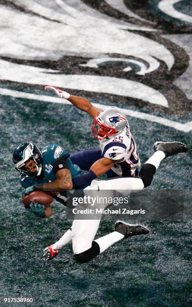 Alshon Jeffery of the Philadelphia Eagles catches a 34-yard touchdown reception during the game against the New England Patriots in Super Bowl LII at...